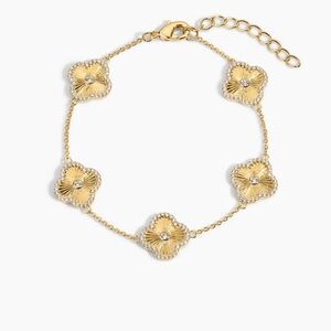 NWT. Elegant Gold Plated Clover Bracelet from Electric Picks